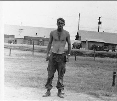 MG Ward S Ryan giving Sp6 Herzog Good Conduct Medal