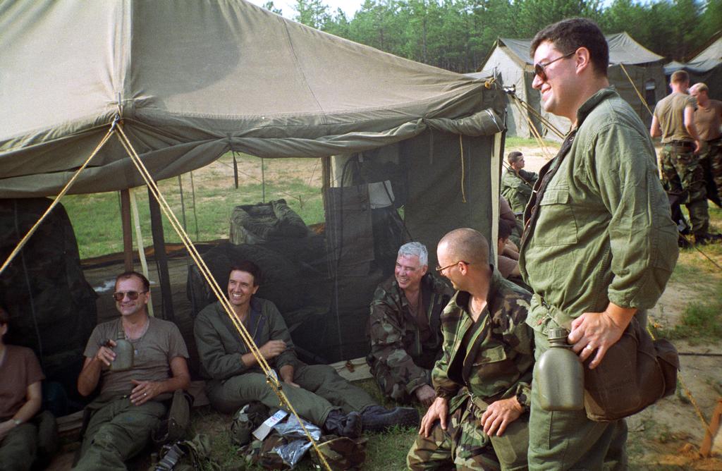 VP toilet with Red Horse hooches (navy quarters) in background