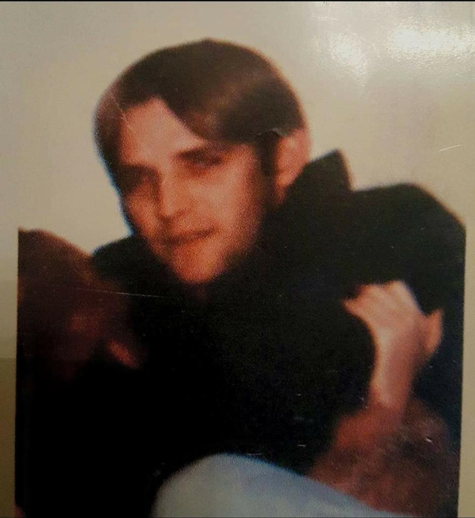 Alvaro Bustos with grandson Ezekiel